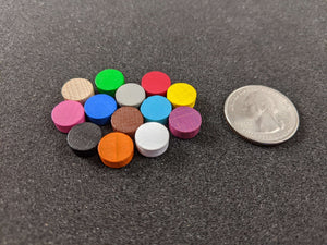tiny wooden disc game pieces