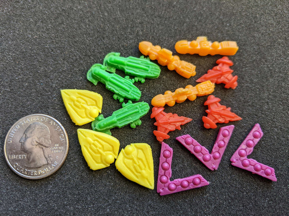 Tiny plastic spaceship pieces