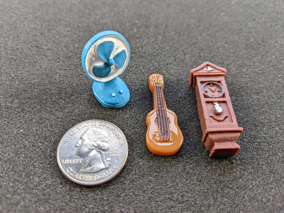 Fan, guitar, and clock tokens