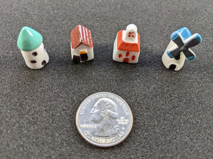Tiny painted board game buildings